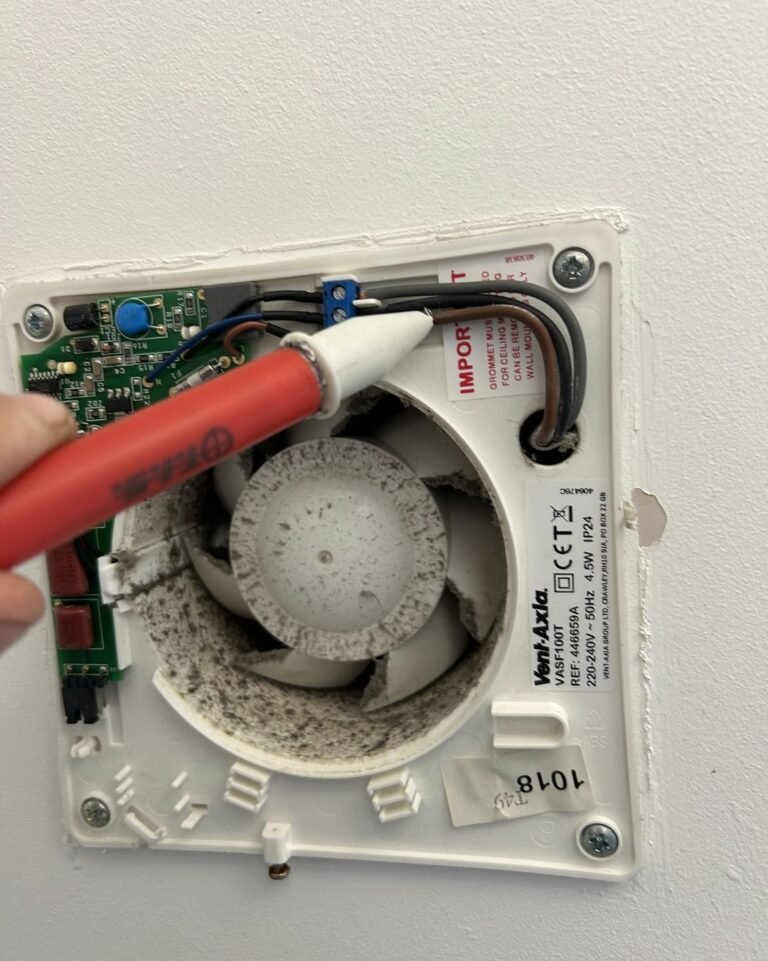 Worn MVHR fan motor being replaced