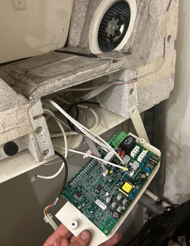 MVHR circuit board being repaired