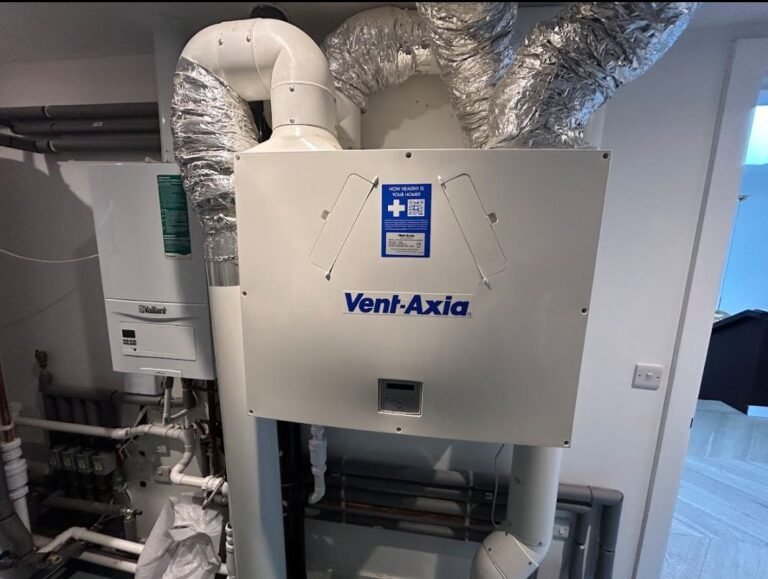 Vent-Axia MVHR unit in a utility cupboard